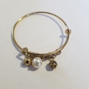 expandable gold tone bangle with faux pearl